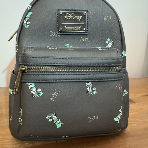 Loungefly Handbags - Disney Loungefly NYC Minnie Mouse Statue of Liberty mini backpack NWT